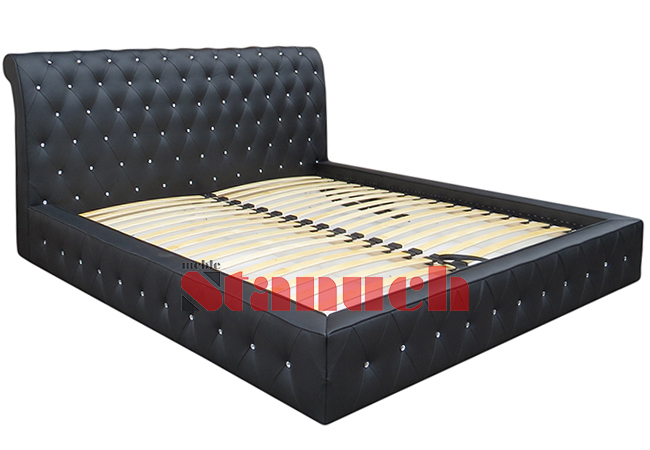 Upholstered quilted bed with crystals